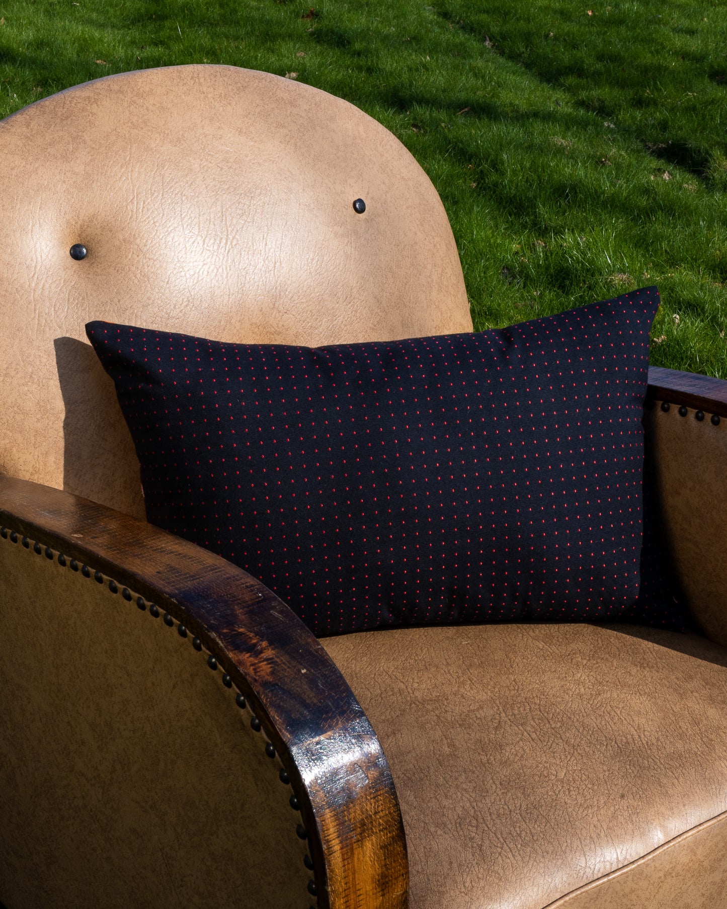 Pillow made from designer fabrics, deadstock fabrics, vintage fabrics, antique fabrics. A dotted Haider Ackermann fabric.