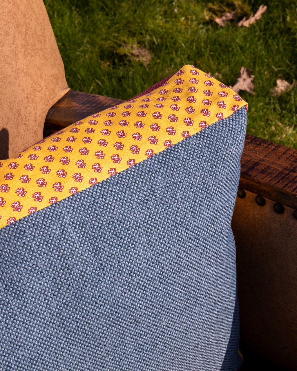 Pillow made from designer fabrics, deadstock fabrics, vintage fabrics, antique fabrics. Blue and warm pink/red panama weave with a vintage “Sormiou” cotton border.